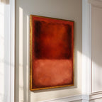 a large, vibrant red abstract painting hanging on a white wall.